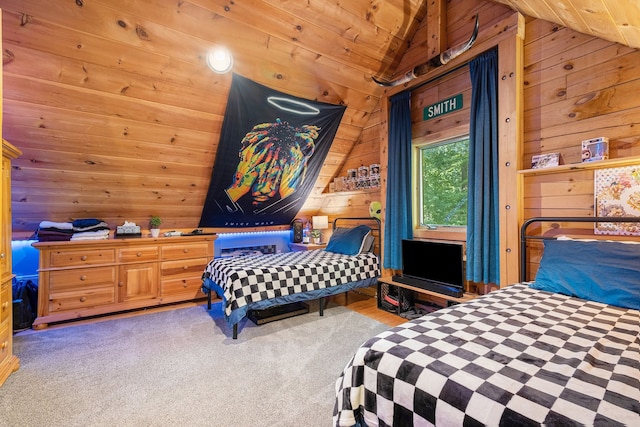 carpeted bedroom featuring lofted ceiling, wooden walls, and wooden ceiling