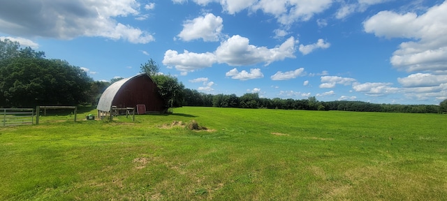 3150 Swaffer Rd, Millington, MI 48746 - view of yard featuring a barn, a view of countryside, and an outdoor structure
