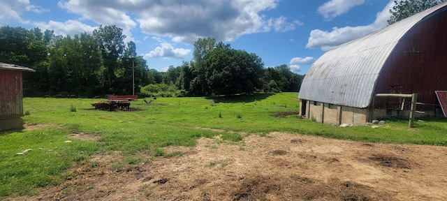 3150 Swaffer Rd, Millington, MI 48746 - view of green lawn with a barn, an outdoor structure, and a garage