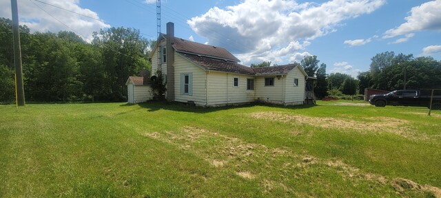 3150 Swaffer Rd, Millington, MI 48746 - view of side of home featuring a yard