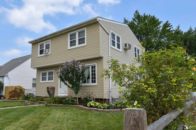 view of front of home with a front lawn