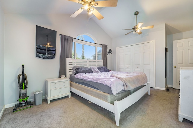 bedroom featuring a closet, light colored carpet, ceiling fan, and lofted ceiling