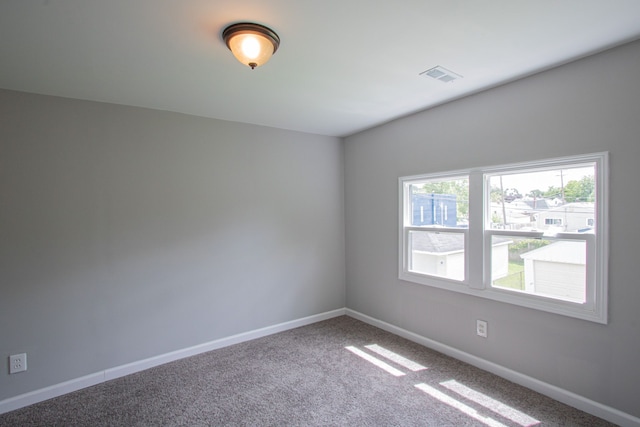 empty room with carpet floors