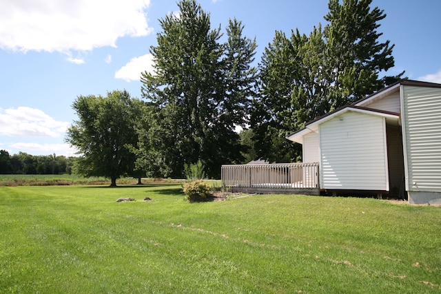 view of yard featuring a deck