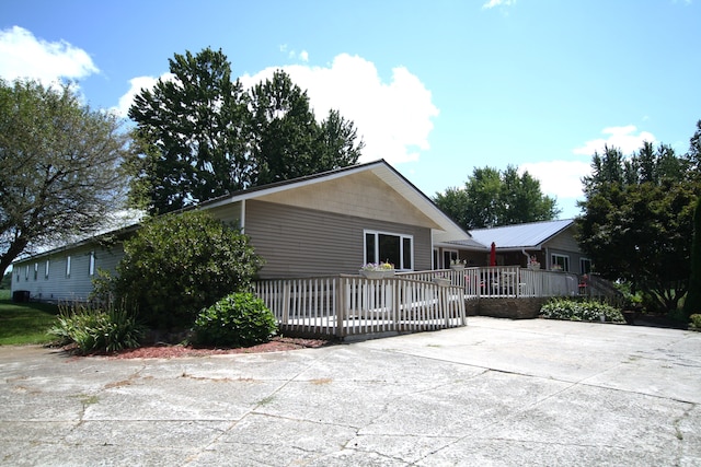 exterior space with a wooden deck