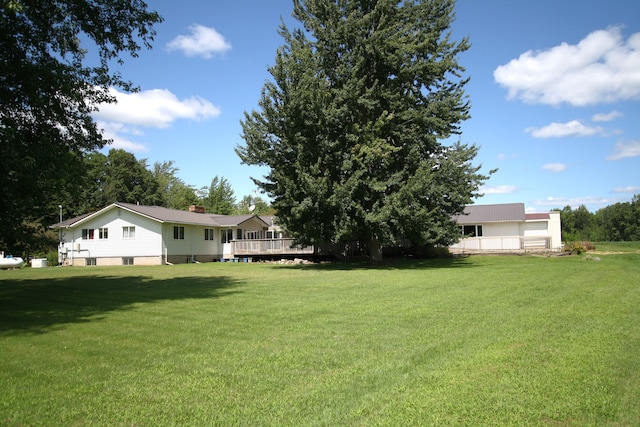 view of yard featuring a deck