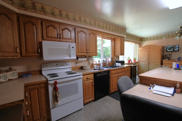 kitchen featuring ceiling fan, white appliances, sink, and wine cooler