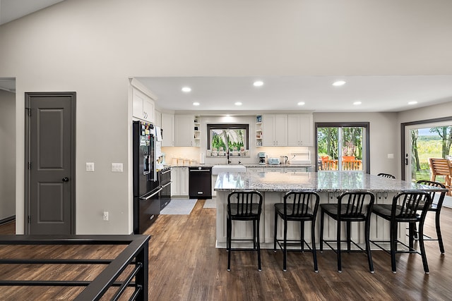 12120 Shaffer Rd, Davisburg, MI 48350 - kitchen with open shelves, black appliances, dark wood-style flooring, white cabinetry, and a sink