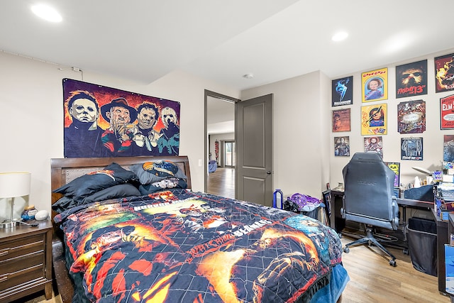 bedroom with light hardwood / wood-style flooring