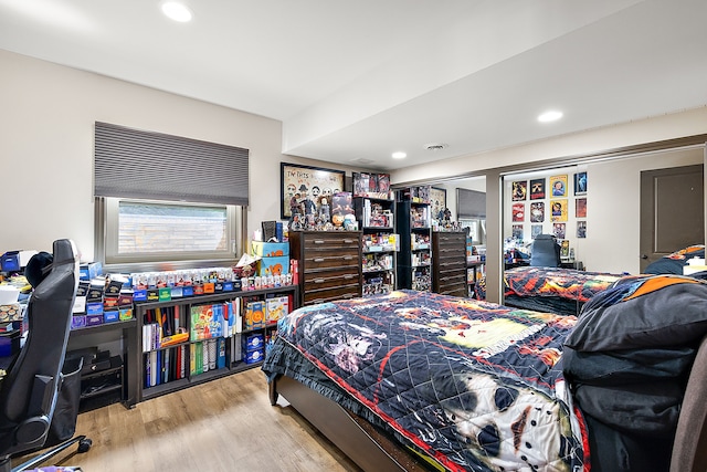 bedroom featuring light hardwood / wood-style floors