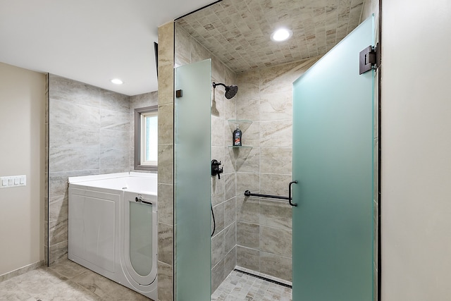 bathroom featuring plus walk in shower