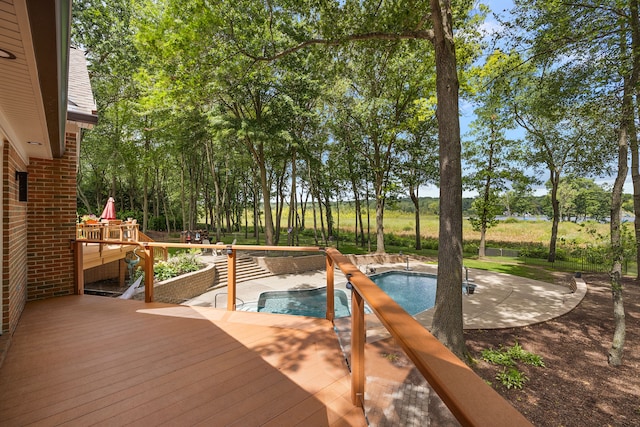 12120 Shaffer Rd, Davisburg, MI 48350 - deck featuring an outdoor pool and view of scattered trees