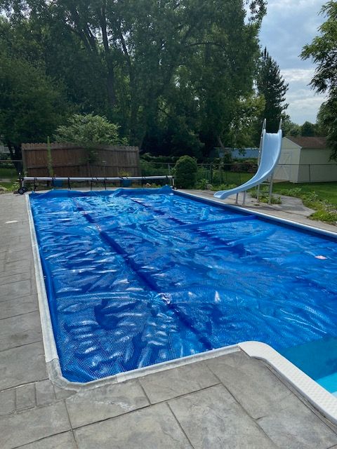 view of pool featuring a water slide