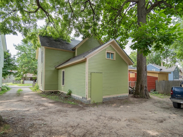935 Osborne St, Kalamazoo, MI 49001 - view of home's exterior with roof with shingles