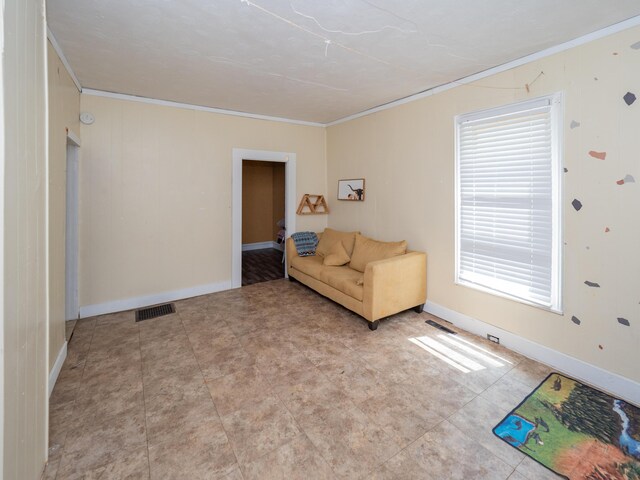 935 Osborne St, Kalamazoo, MI 49001 - sitting room featuring crown molding and baseboards