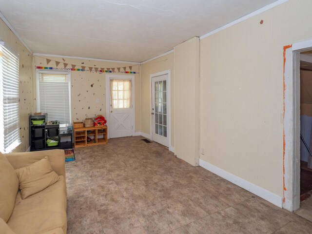 935 Osborne St, Kalamazoo, MI 49001 - living area featuring crown molding and baseboards
