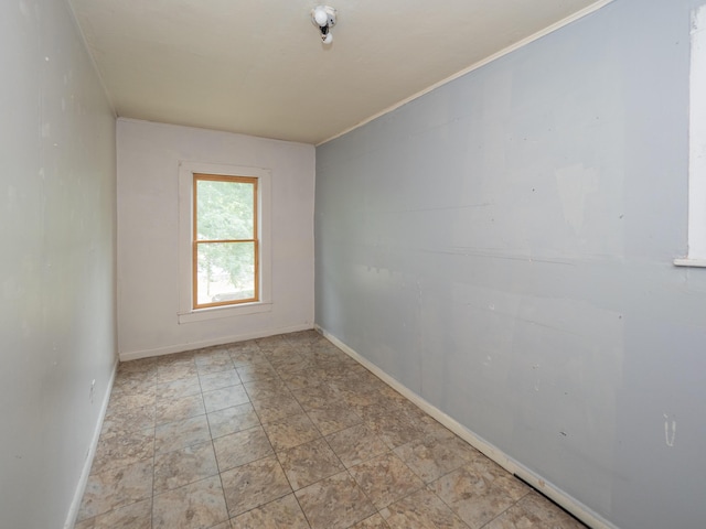 935 Osborne St, Kalamazoo, MI 49001 - empty room featuring baseboards and stone finish flooring