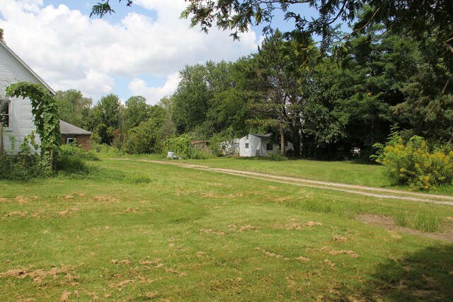 50741 N Ave, Macomb, MI 48042 - view of grassy yard with an outdoor structure
