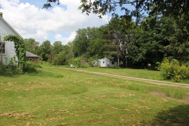 50741 N Ave, Macomb, MI 48042 - view of grassy yard featuring an outbuilding