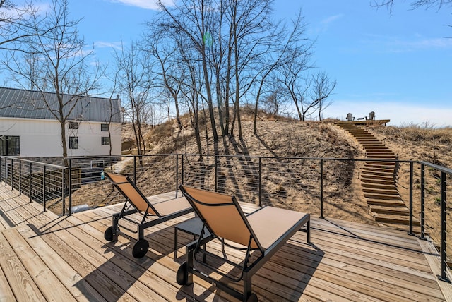 wooden deck featuring stairway