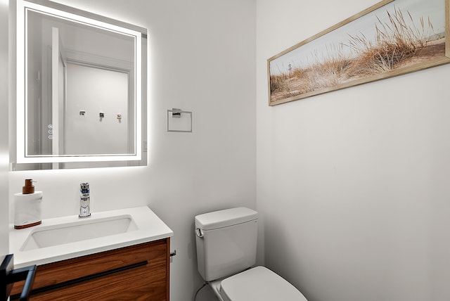 half bath with toilet and vanity