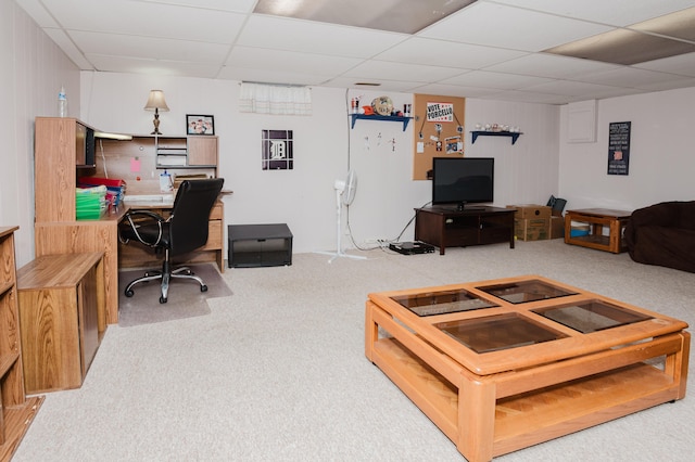 carpeted office featuring a drop ceiling