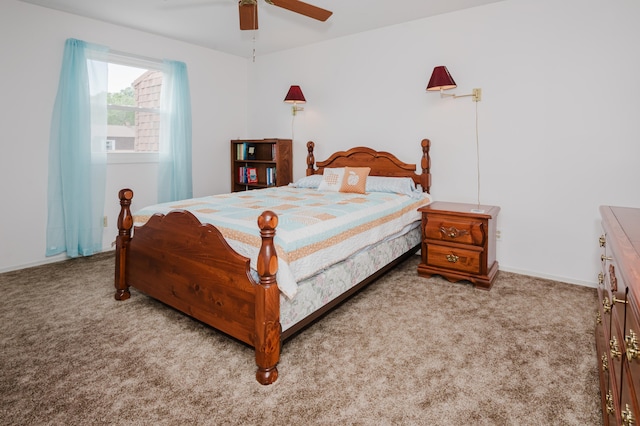 bedroom featuring ceiling fan and light carpet