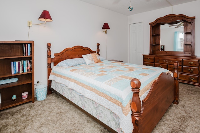 carpeted bedroom featuring a closet