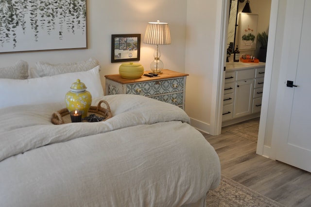 bedroom with light hardwood / wood-style floors