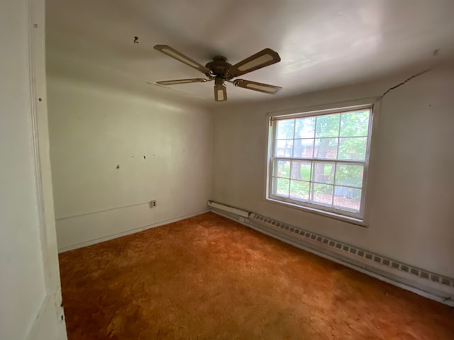 unfurnished room with carpet, a baseboard radiator, and ceiling fan