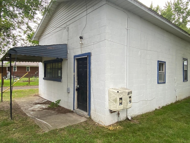 rear view of house with a yard