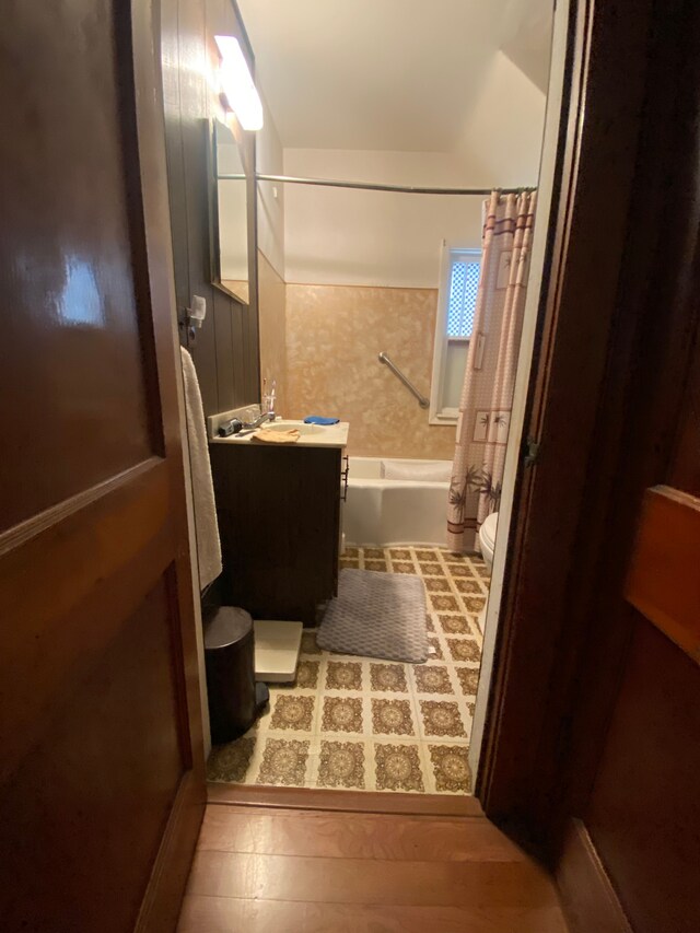 102 Jean St, Yale, MI 48097 - bathroom with toilet, vanity, and shower / bathtub combination with curtain