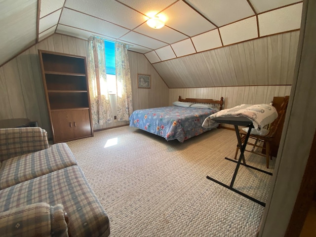 carpeted bedroom featuring vaulted ceiling