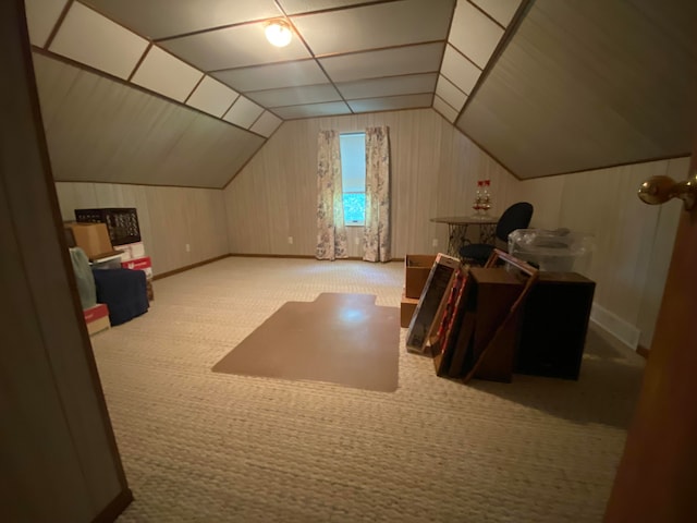 bonus room featuring carpet flooring and vaulted ceiling