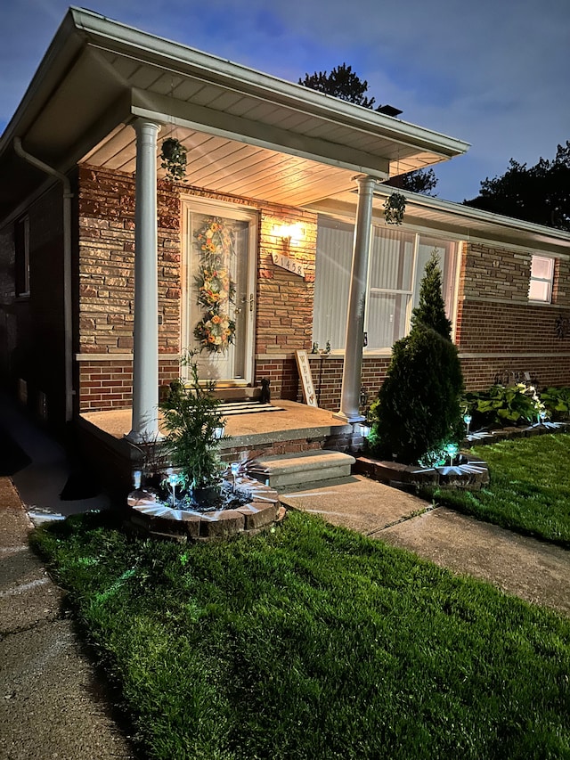 view of home's exterior featuring covered porch