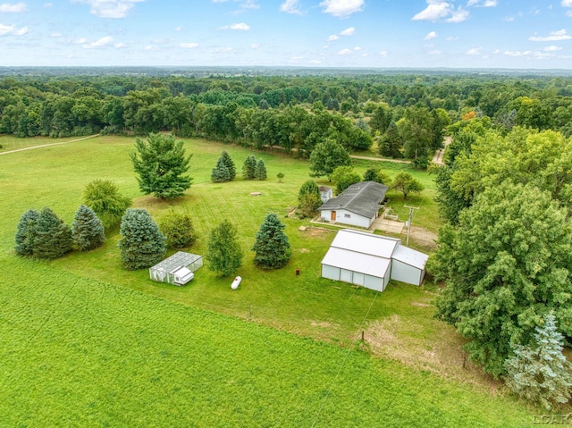 birds eye view of property featuring a rural view