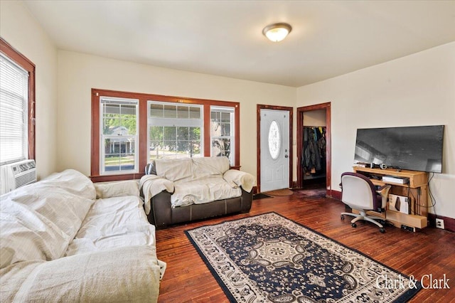 living room with dark hardwood / wood-style floors