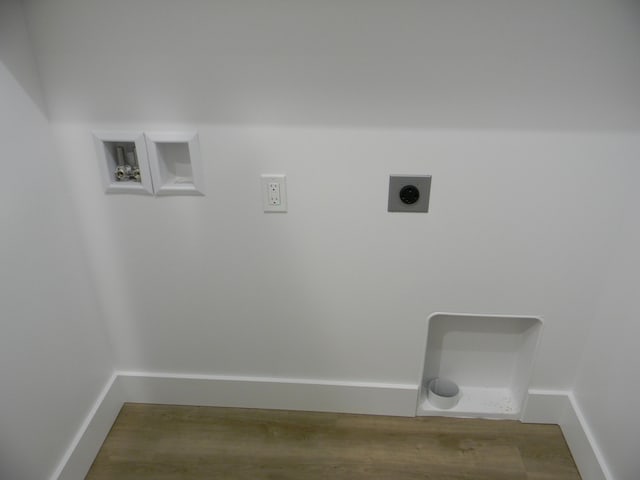 washroom featuring washer hookup, electric dryer hookup, and hardwood / wood-style floors