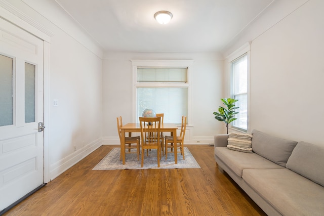 dining area featuring hardwood / wood-style floors