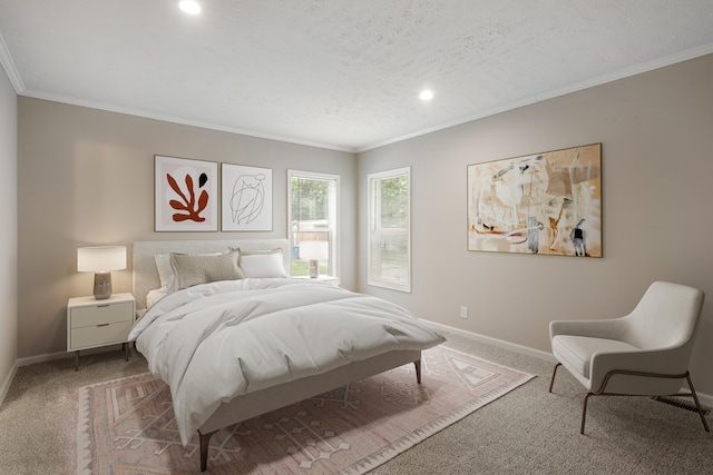 bedroom featuring carpet, crown molding, and a textured ceiling