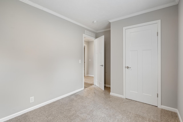 unfurnished bedroom with light carpet and ornamental molding