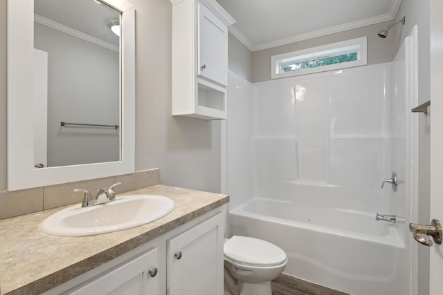 full bathroom featuring ornamental molding, bathing tub / shower combination, toilet, vanity, and hardwood / wood-style flooring