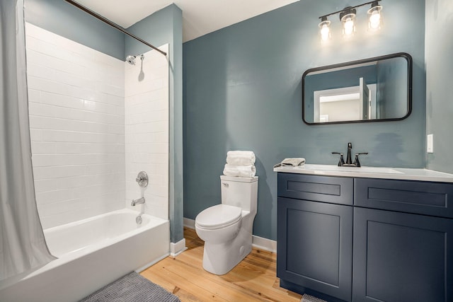 full bathroom with shower / bathtub combination with curtain, vanity, toilet, and wood-type flooring