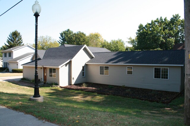 2960 W John Beers Rd, Stevensville, MI 49127 - view of property exterior featuring a lawn