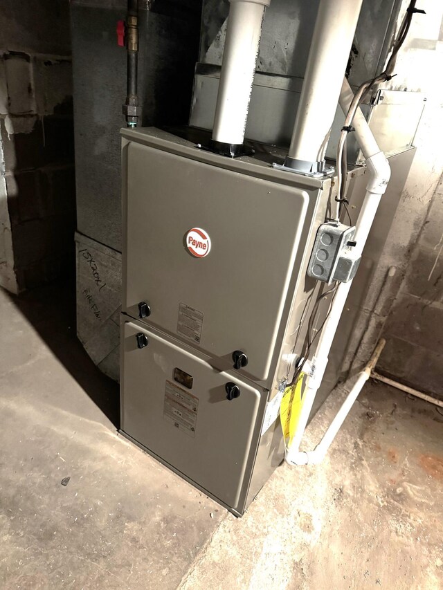 2960 W John Beers Rd, Stevensville, MI 49127 - utility room with heating unit