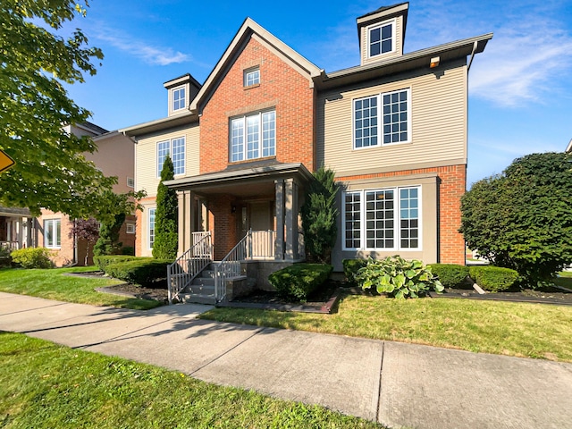 view of front of house featuring a front lawn