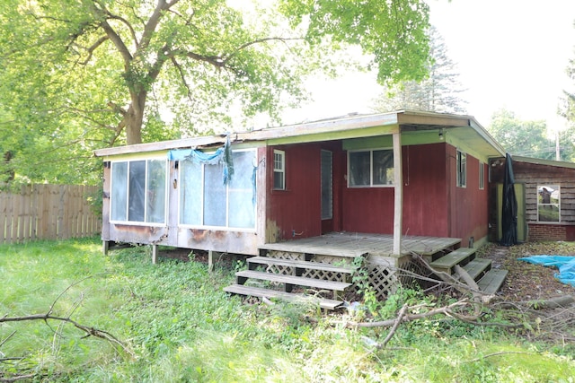 4318 Tommy Armour Dr, Flint, MI 48506 - back of house featuring a wooden deck