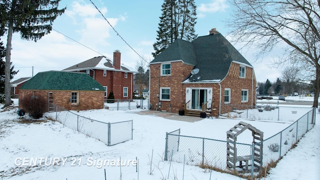 view of snow covered property