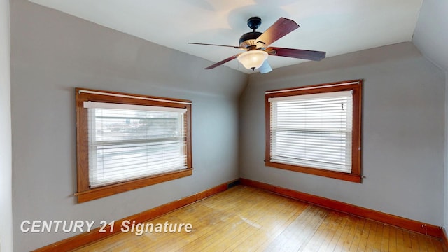 spare room featuring light hardwood / wood-style flooring and ceiling fan