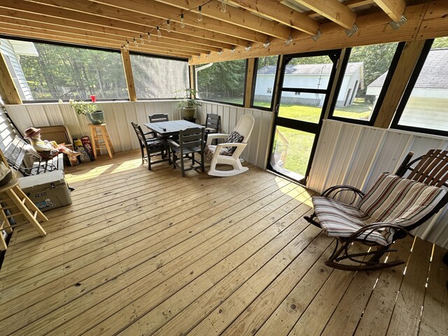 2717 N Sherman Rd, Ludington, MI 49431 - sunroom / solarium featuring outdoor dining area